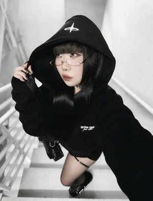 xxiaobaituu wearing INTRA ONE's signature hoodie, in a dark monochromatic aesthetic