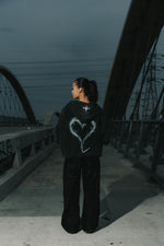 INTRA ONE's Toxic Love Zip Up Jacket on Female Model, showing back smoke heart design