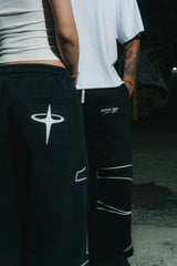Back and front view of INTRA ONE's signature sweats in black