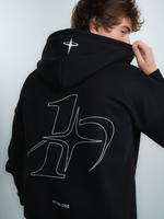 male model wearing INTRA ONE's signature hoodie in black, back view