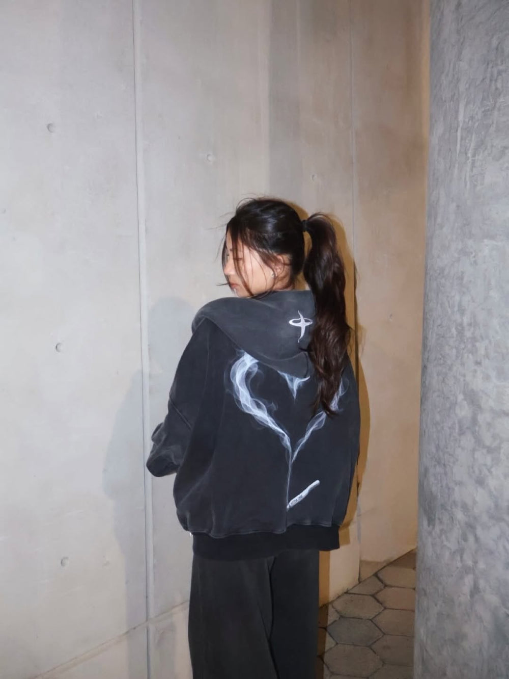 vn_evian wearing INTRA ONE's toxic love zip up jacket
