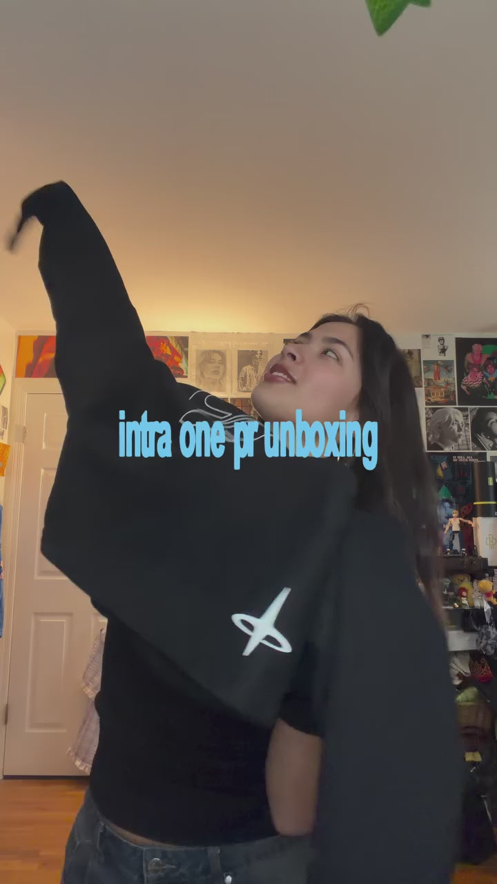 katieerus unboxing INTRA ONE's signature hoodie in black, giving her review